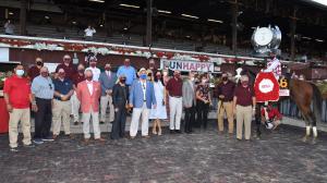 The members of Sackatoga Stable with Tiz the Law after winning the Runhappy Travers at Saratoga